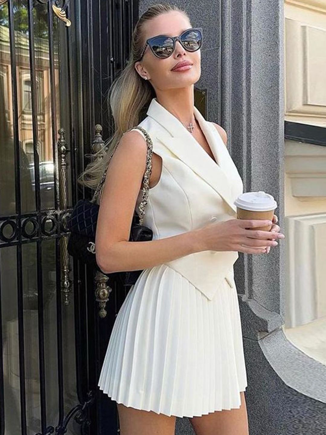 White Sleeveless Double-Breasted Vest & Accordion Pleat Mini Skirt Co-ord Set - Image 3