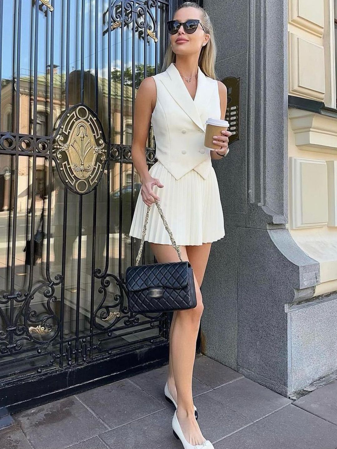 White Sleeveless Double-Breasted Vest & Accordion Pleat Mini Skirt Co-ord Set - Image 4